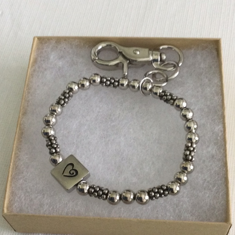 Woman’s Beaded Stretch Bracelet or key Chain color sliver has charm of a heart